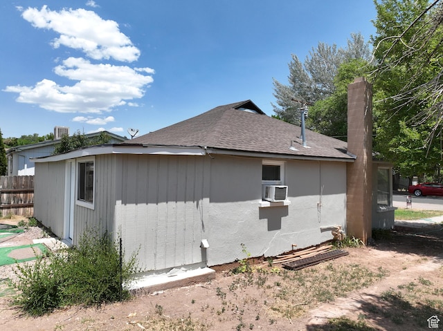 440 S 200 W, Richfield, UT 84701 - view of side of home with a shingled roof and cooling unit