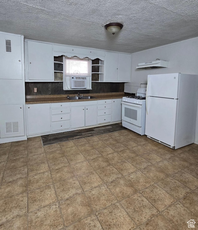 kitchen featuring visible vents, white appliances, dark countertops, under cabinet range hood, and open shelves