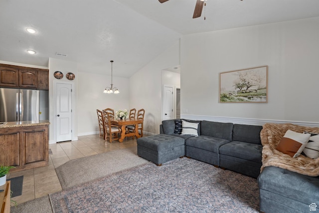 343 S 790 W Unit 301, Pleasant Grove, UT 84062 - living room with lofted ceiling, ceiling fan with notable chandelier, baseboards, light tile patterned flooring, and visible vents