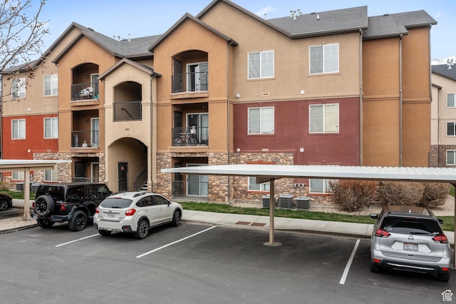 343 S 790 W Unit 301, Pleasant Grove, UT 84062 - view of building exterior featuring covered and uncovered parking
