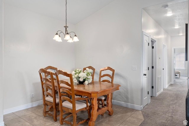 343 S 790 W Unit 301, Pleasant Grove, UT 84062 - dining space with light tile patterned floors, baseboards, and a chandelier