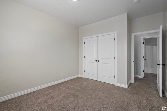 343 S 790 W Unit 301, Pleasant Grove, UT 84062 - unfurnished bedroom with a closet, carpet, and baseboards