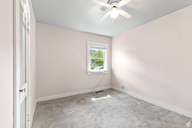 325 E 300 S, Logan, UT 84321 - spare room featuring carpet floors, a ceiling fan, and baseboards