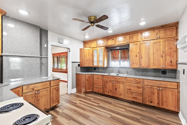 325 E 300 S, Logan, UT 84321 - kitchen with a ceiling fan, a sink, decorative backsplash, light wood finished floors, and recessed lighting