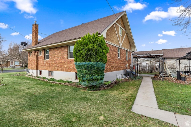 325 E 300 S, Logan, UT 84321 - view of side of property with a gazebo, a chimney, brick siding, and a yard
