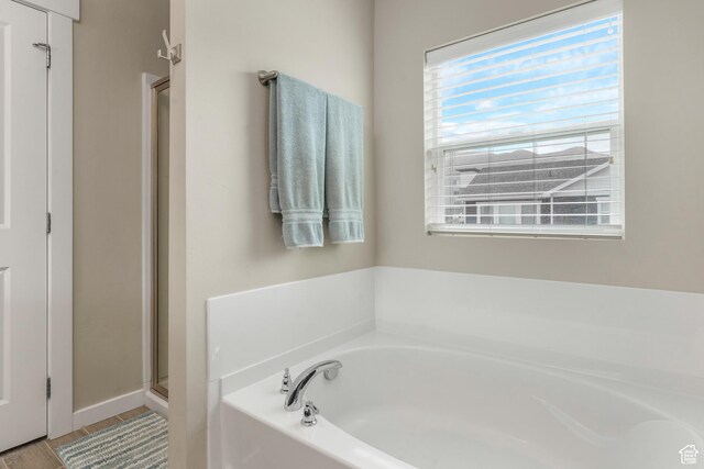 15226 S Glory Dr W, Bluffdale, UT 84065 - full bath with a bath, baseboards, and a shower stall