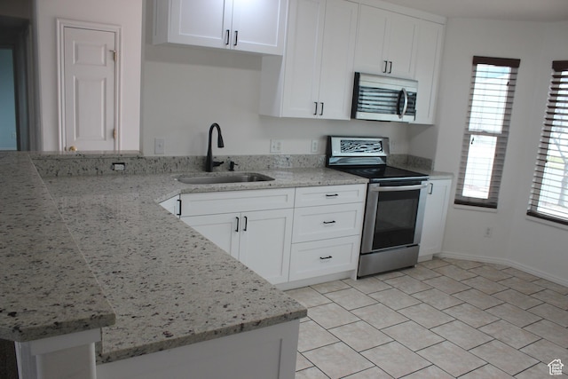 987 S 790 W, Lehi, UT 84043 - kitchen featuring white cabinetry, light stone countertops, a sink, and stainless steel appliances
