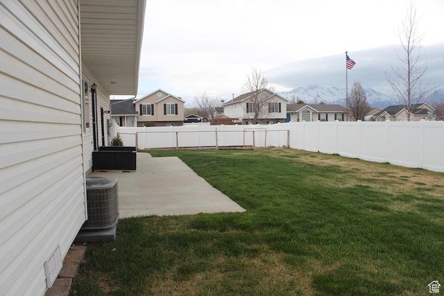 987 S 790 W, Lehi, UT 84043 - view of yard featuring a patio, central air condition unit, a fenced backyard, and a residential view