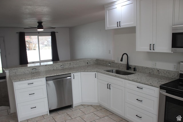 987 S 790 W, Lehi, UT 84043 - kitchen featuring white cabinets, a sink, a ceiling fan, and appliances with stainless steel finishes