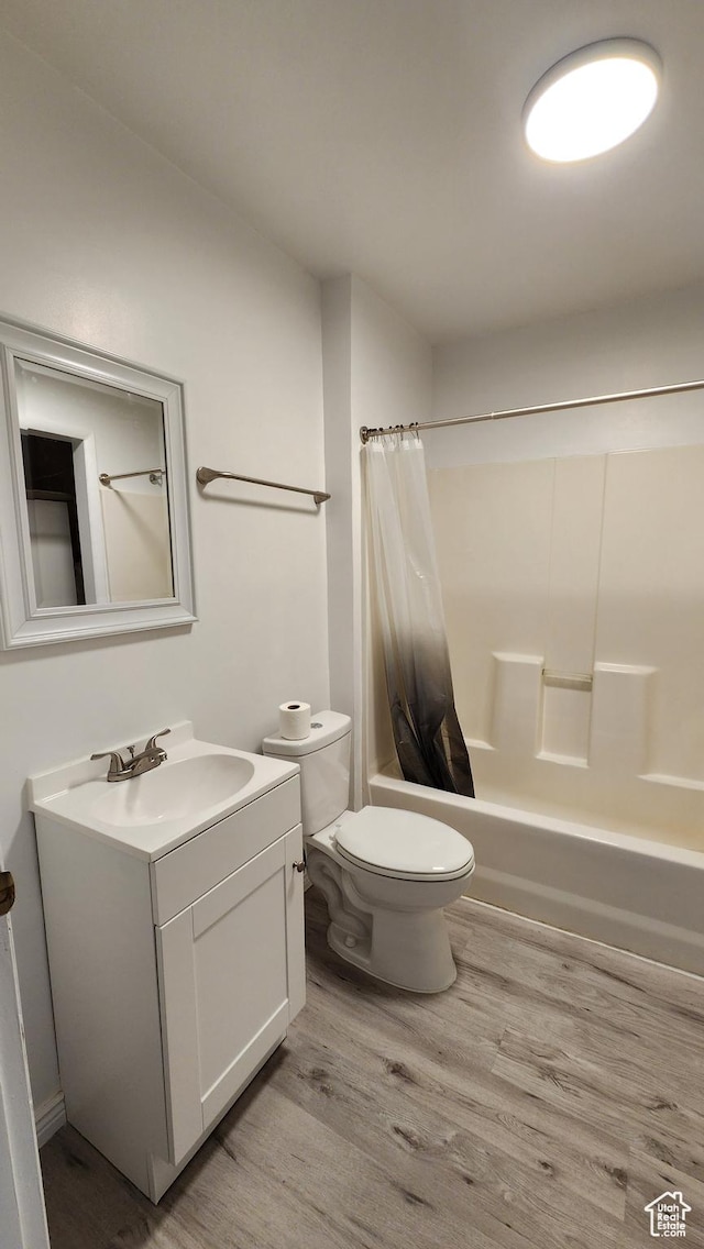 84 N 550 E, Spring City, UT 84662 - bathroom with toilet, vanity, shower / bathtub combination with curtain, and wood finished floors