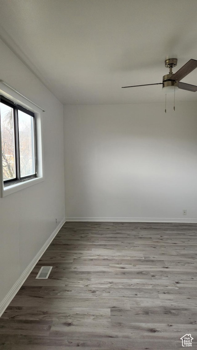 84 N 550 E, Spring City, UT 84662 - unfurnished room with baseboards, visible vents, wood finished floors, and a ceiling fan