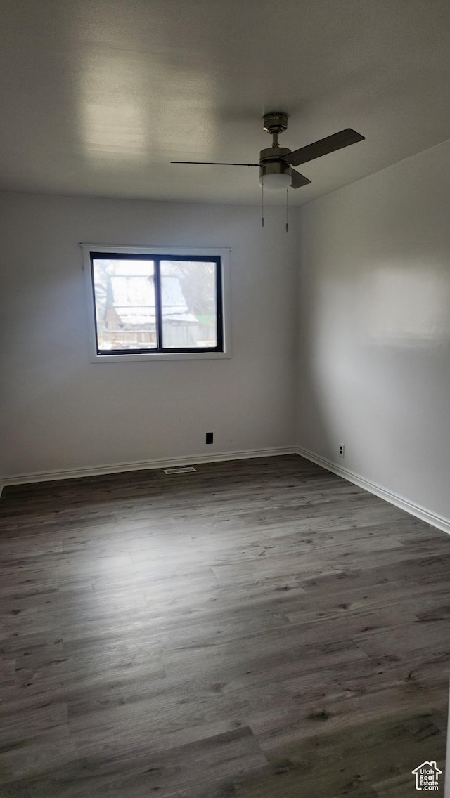 84 N 550 E, Spring City, UT 84662 - spare room featuring a ceiling fan, dark wood-style flooring, baseboards, and visible vents