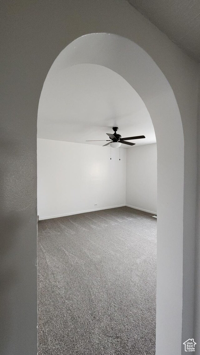 84 N 550 E, Spring City, UT 84662 - carpeted empty room with arched walkways and ceiling fan