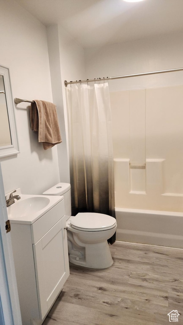 84 N 550 E, Spring City, UT 84662 - bathroom with toilet, vanity, shower / bathtub combination with curtain, and wood finished floors
