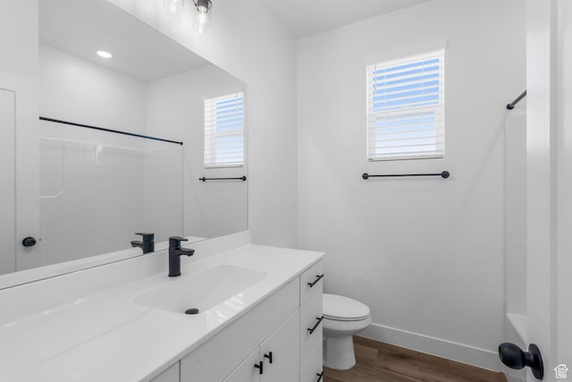 2841 N Rosie Loop N, Cedar City, UT 84721 - bathroom with a shower, vanity, toilet, baseboards, and wood finished floors