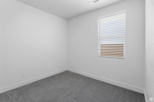 2841 N Rosie Loop N, Cedar City, UT 84721 - spare room with baseboards, visible vents, and dark carpet