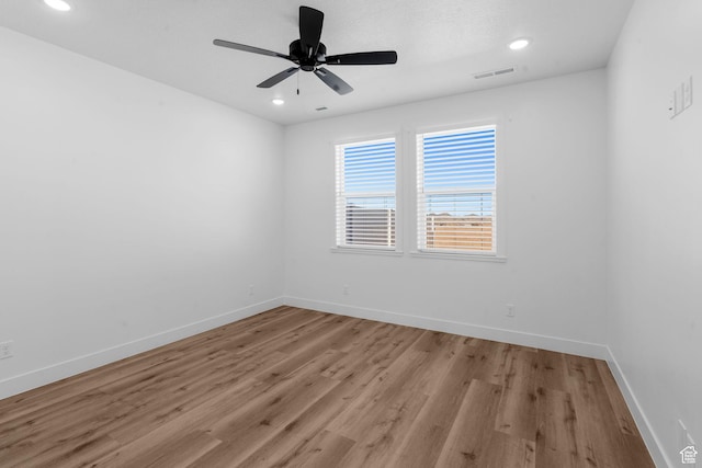 2841 N Rosie Loop N, Cedar City, UT 84721 - empty room featuring light wood-style flooring, recessed lighting, baseboards, and visible vents