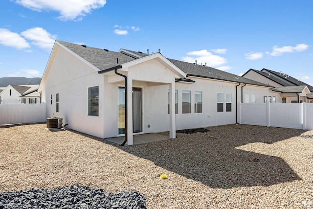 2841 N Rosie Loop N, Cedar City, UT 84721 - rear view of property with a fenced backyard, stucco siding, a patio area, and central AC