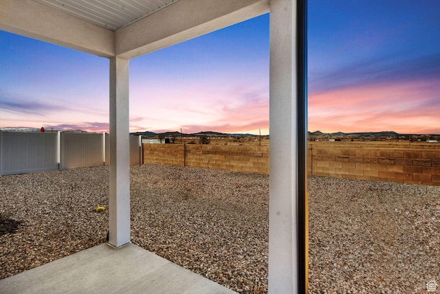 2841 N Rosie Loop N, Cedar City, UT 84721 - yard at dusk with a fenced backyard
