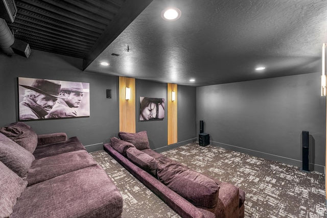 cinema with baseboards, recessed lighting, carpet flooring, and a textured ceiling