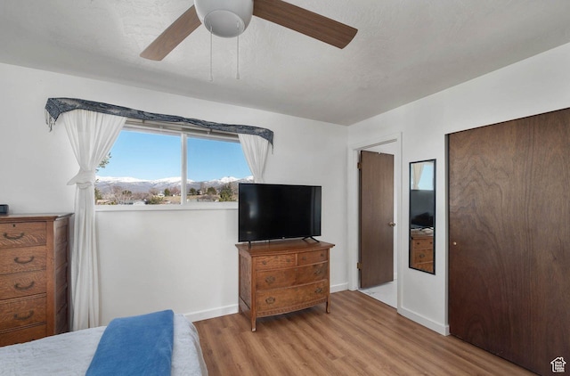 761 E Raygene Way S, North Salt Lake, UT 84054 - bedroom featuring baseboards, wood finished floors, ceiling fan, and a textured ceiling