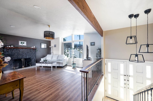 761 E Raygene Way S, North Salt Lake, UT 84054 - living room with baseboards, vaulted ceiling with beams, wood finished floors, and a fireplace with raised hearth