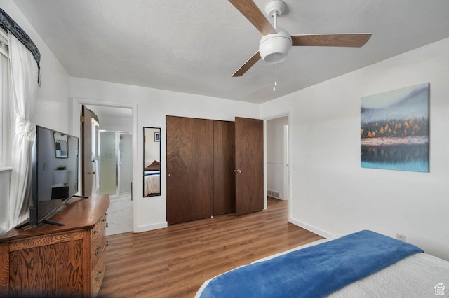 761 E Raygene Way S, North Salt Lake, UT 84054 - bedroom featuring baseboards, wood finished floors, ceiling fan, and ensuite bathroom