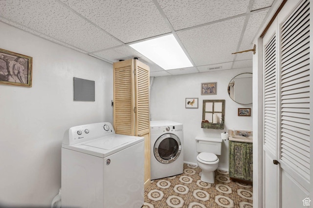 761 E Raygene Way S, North Salt Lake, UT 84054 - washroom featuring visible vents, laundry area, tile patterned floors, a sink, and washer and dryer