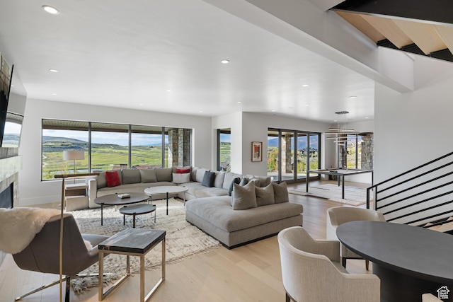 7045 E Moon Light Dr, Heber City, UT 84032 - living area featuring wood finished floors, recessed lighting, and a tile fireplace