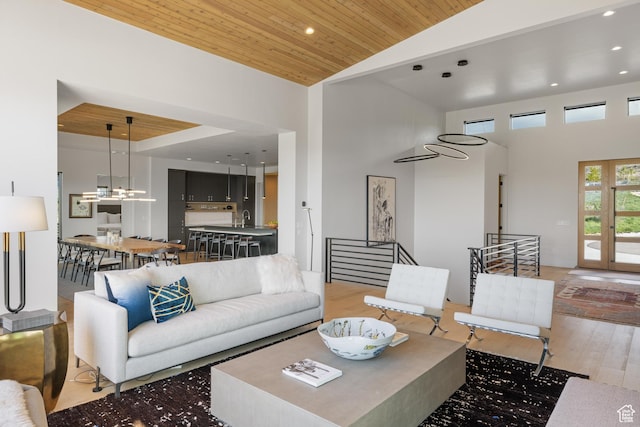 7045 E Moon Light Dr, Heber City, UT 84032 - living room with high vaulted ceiling, wooden ceiling, light wood-type flooring, and recessed lighting