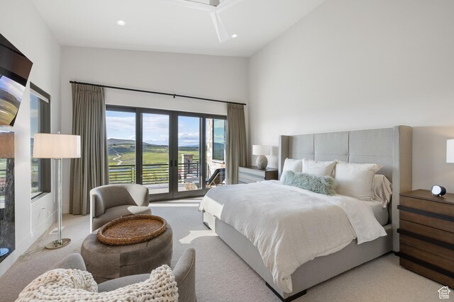 7045 E Moon Light Dr, Heber City, UT 84032 - carpeted bedroom featuring access to exterior, a high ceiling, and recessed lighting
