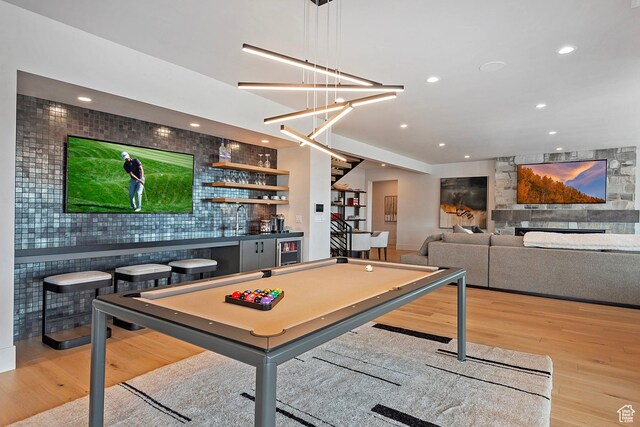 7045 E Moon Light Dr, Heber City, UT 84032 - playroom featuring wood finished floors, beverage cooler, bar with sink, billiards, and recessed lighting