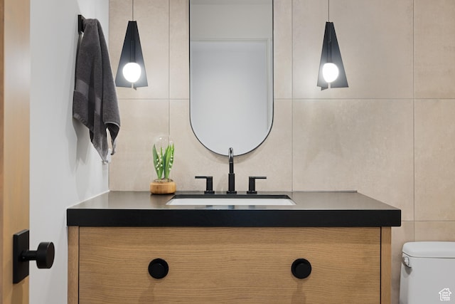 7045 E Moon Light Dr, Heber City, UT 84032 - half bath with vanity, toilet, and tile walls