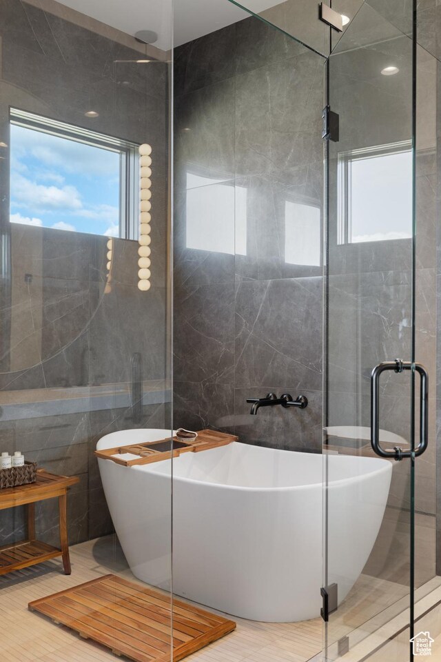 7045 E Moon Light Dr, Heber City, UT 84032 - full bath with tile walls, a soaking tub, and a shower stall
