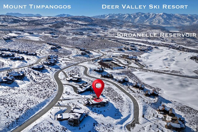 7045 E Moon Light Dr, Heber City, UT 84032 - snowy aerial view with a mountain view