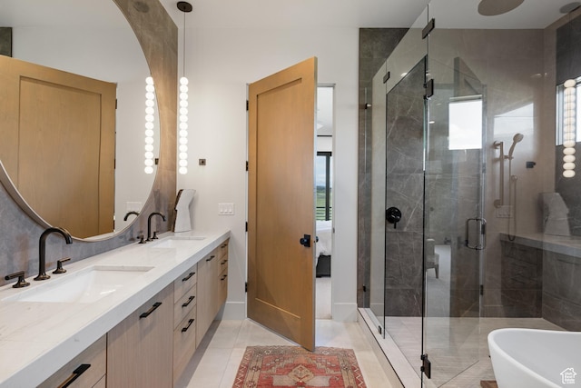 7045 E Moon Light Dr, Heber City, UT 84032 - ensuite bathroom featuring double vanity, a shower stall, tile patterned floors, and a freestanding tub