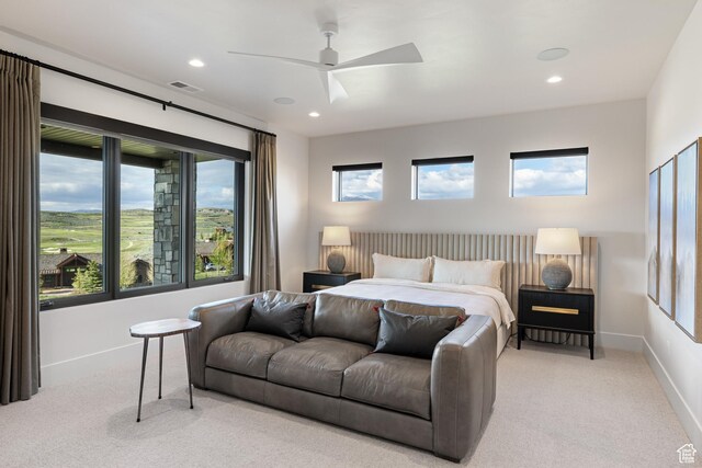 7045 E Moon Light Dr, Heber City, UT 84032 - bedroom featuring light carpet, multiple windows, recessed lighting, and baseboards