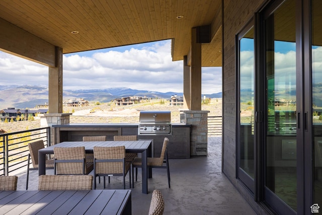 7045 E Moon Light Dr, Heber City, UT 84032 - wooden deck featuring a mountain view and outdoor dining space