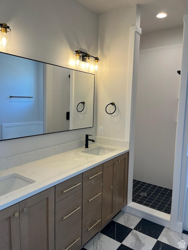 full bathroom with double vanity, a sink, recessed lighting, and marble finish floor