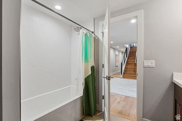 8680 Saddleback Cir, Park City, UT 84098 - bathroom featuring wood finished floors, shower / tub combo, vanity, recessed lighting, and baseboards
