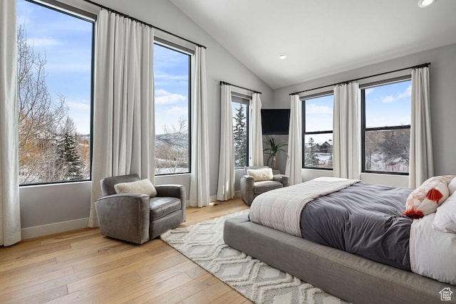 8680 Saddleback Cir, Park City, UT 84098 - bedroom with lofted ceiling, baseboards, recessed lighting, and light wood-style flooring