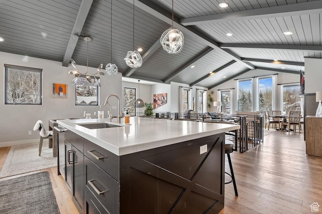 8680 Saddleback Cir, Park City, UT 84098 - kitchen featuring a sink, baseboards, light countertops, light wood finished floors, and recessed lighting
