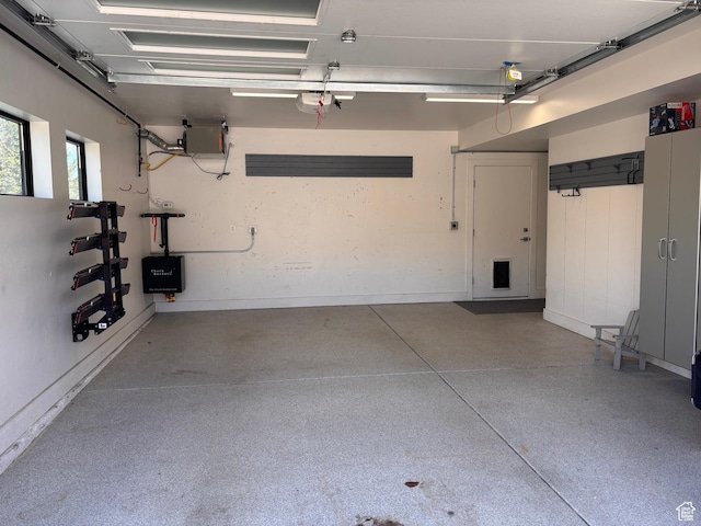 8680 Saddleback Cir, Park City, UT 84098 - garage featuring a garage door opener and baseboards