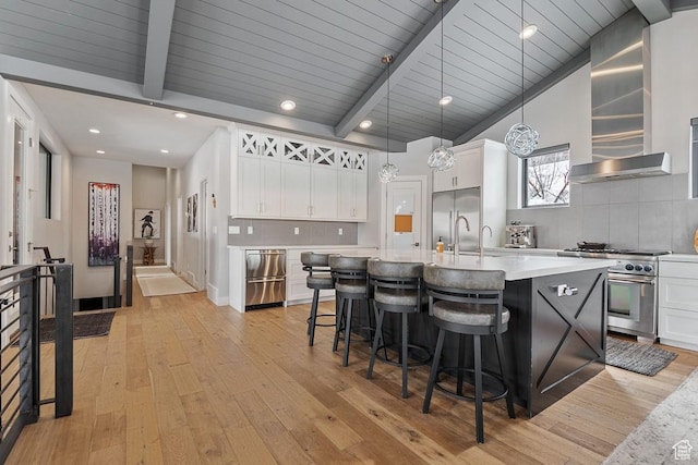 8680 Saddleback Cir, Park City, UT 84098 - kitchen with premium appliances, tasteful backsplash, light wood finished floors, and recessed lighting
