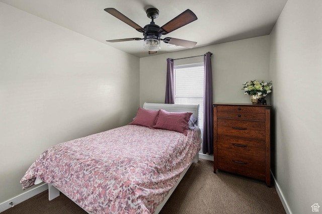 bedroom featuring baseboards, carpet, and a ceiling fan