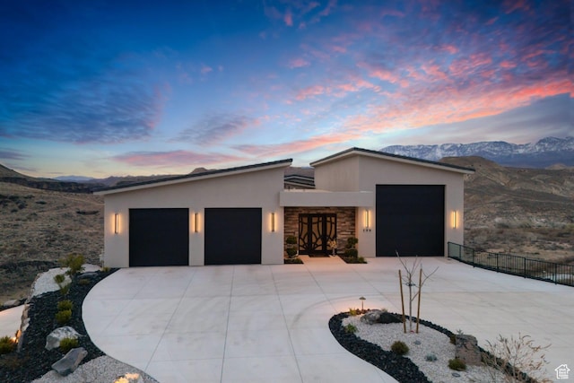 599 W 170 S, La Verkin, UT 84745 - contemporary home featuring driveway, stucco siding, fence, a garage, and a mountain view