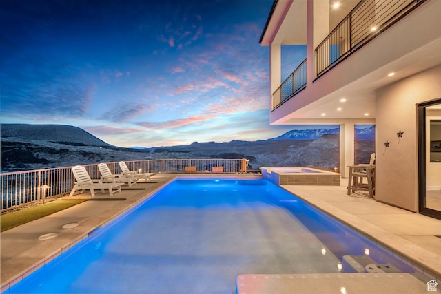 599 W 170 S, La Verkin, UT 84745 - pool at dusk with a mountain view, a fenced in pool, and a patio area