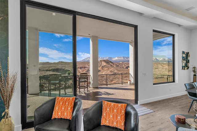 599 W 170 S, La Verkin, UT 84745 - living room featuring baseboards, visible vents, wood finished floors, and a mountain view