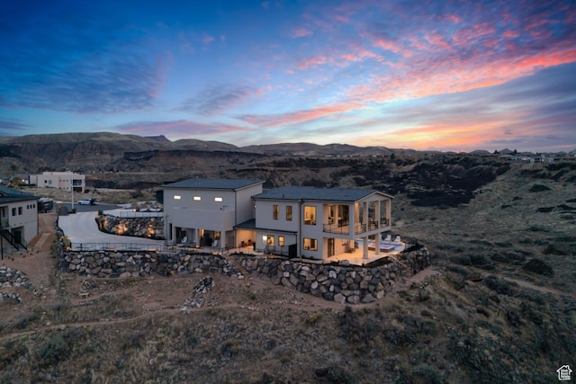 599 W 170 S, La Verkin, UT 84745 - back of house featuring stucco siding, a mountain view, and a balcony
