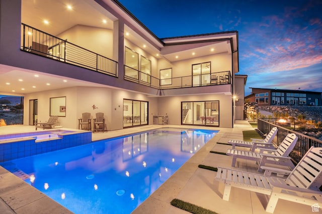 599 W 170 S, La Verkin, UT 84745 - view of swimming pool featuring a pool with connected hot tub and a patio area